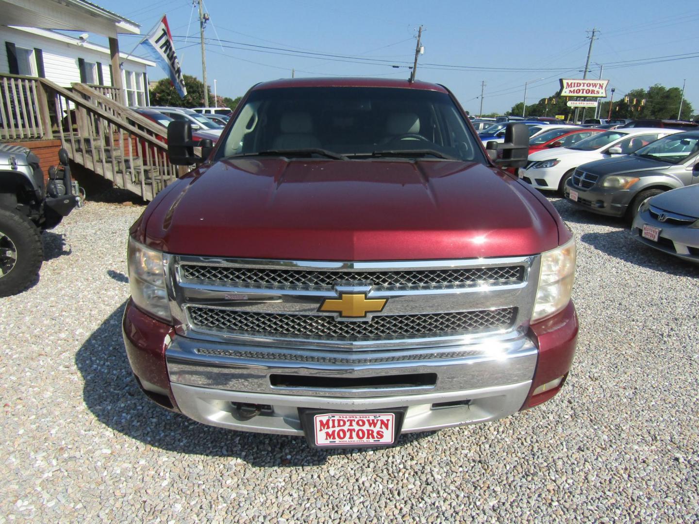 2013 Red /Gray Chevrolet Silverado 1500 LT Crew Cab 4WD (3GCPKSE78DG) with an 5.3L V8 OHV 16V FFV engine, Automatic transmission, located at 15016 S Hwy 231, Midland City, AL, 36350, (334) 983-3001, 31.306210, -85.495277 - Photo#1