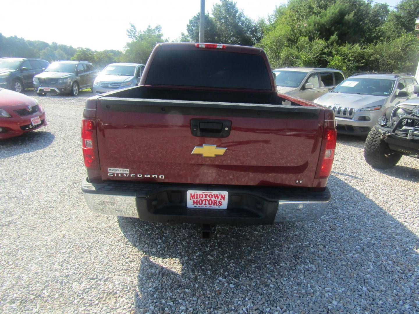 2013 Red /Gray Chevrolet Silverado 1500 LT Crew Cab 4WD (3GCPKSE78DG) with an 5.3L V8 OHV 16V FFV engine, Automatic transmission, located at 15016 S Hwy 231, Midland City, AL, 36350, (334) 983-3001, 31.306210, -85.495277 - Photo#6