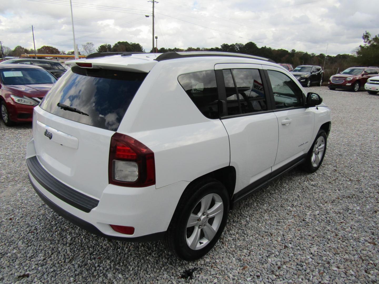 2016 White Jeep Compass Sport FWD (1C4NJCBA7GD) with an 2.0L L4 DOHC 16V engine, Automatic transmission, located at 15016 S Hwy 231, Midland City, AL, 36350, (334) 983-3001, 31.306210, -85.495277 - Photo#6