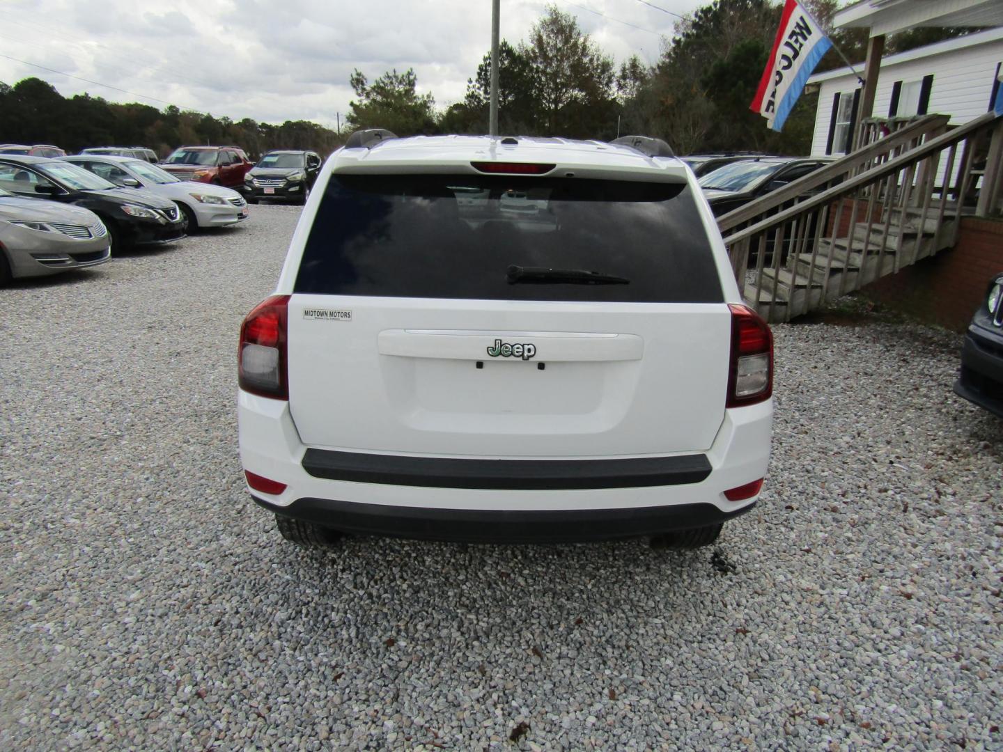 2016 White Jeep Compass Sport FWD (1C4NJCBA7GD) with an 2.0L L4 DOHC 16V engine, Automatic transmission, located at 15016 S Hwy 231, Midland City, AL, 36350, (334) 983-3001, 31.306210, -85.495277 - Photo#8
