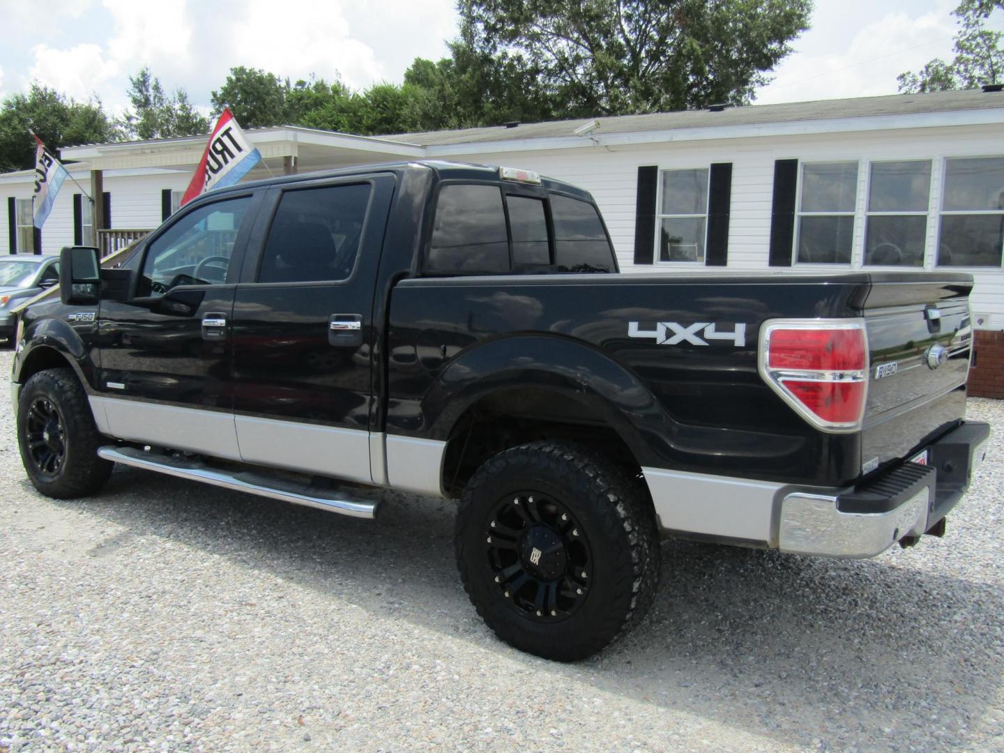 2013 Black Ford F-150 XLT SuperCrew 6.5-ft. Bed 4WD (1FTFW1ET9DF) with an 3.5L V6 TURBO engine, Automatic transmission, located at 15016 S Hwy 231, Midland City, AL, 36350, (334) 983-3001, 31.306210, -85.495277 - Photo#7
