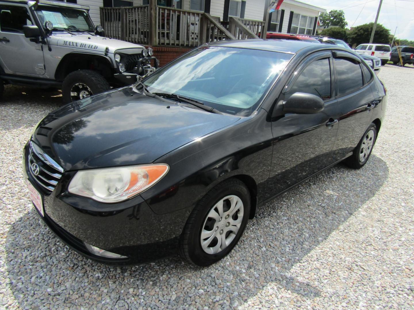 2010 Black Hyundai Elantra GLS (KMHDU4AD1AU) with an 2.0L L4 DOHC 16V engine, Automatic transmission, located at 15016 S Hwy 231, Midland City, AL, 36350, (334) 983-3001, 31.306210, -85.495277 - Photo#2
