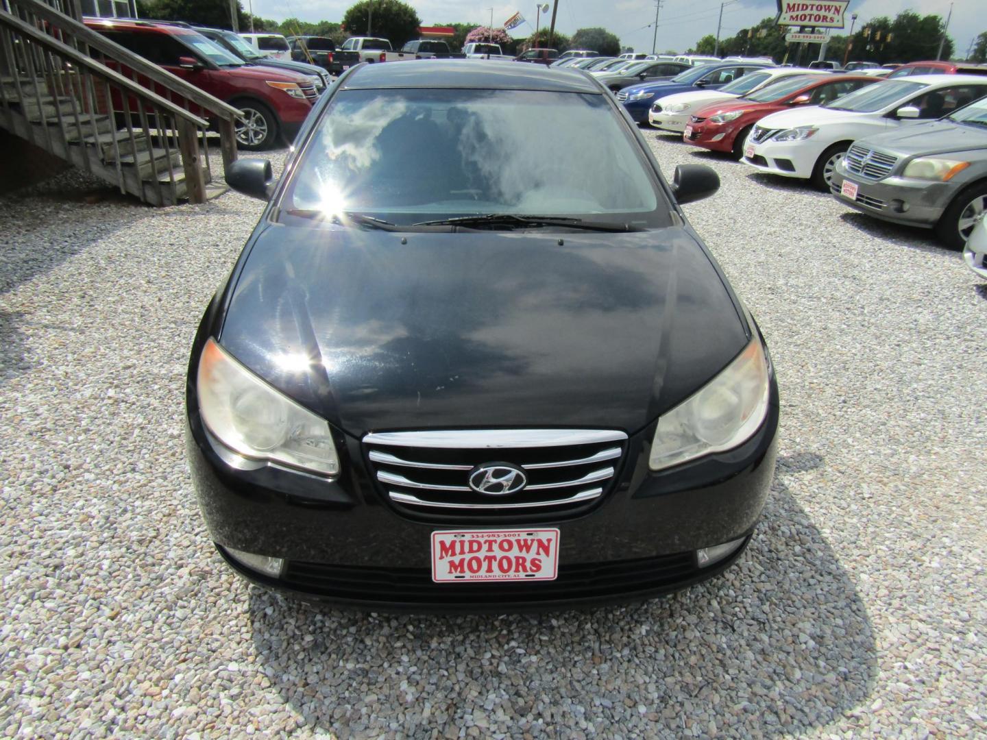 2010 Black Hyundai Elantra GLS (KMHDU4AD1AU) with an 2.0L L4 DOHC 16V engine, Automatic transmission, located at 15016 S Hwy 231, Midland City, AL, 36350, (334) 983-3001, 31.306210, -85.495277 - Photo#1