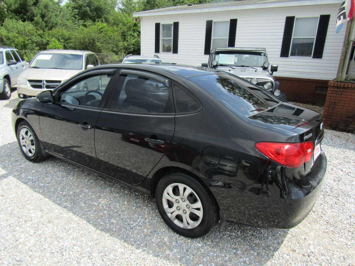 2010 Black Hyundai Elantra GLS (KMHDU4AD1AU) with an 2.0L L4 DOHC 16V engine, Automatic transmission, located at 15016 S Hwy 231, Midland City, AL, 36350, (334) 983-3001, 31.306210, -85.495277 - Photo#5