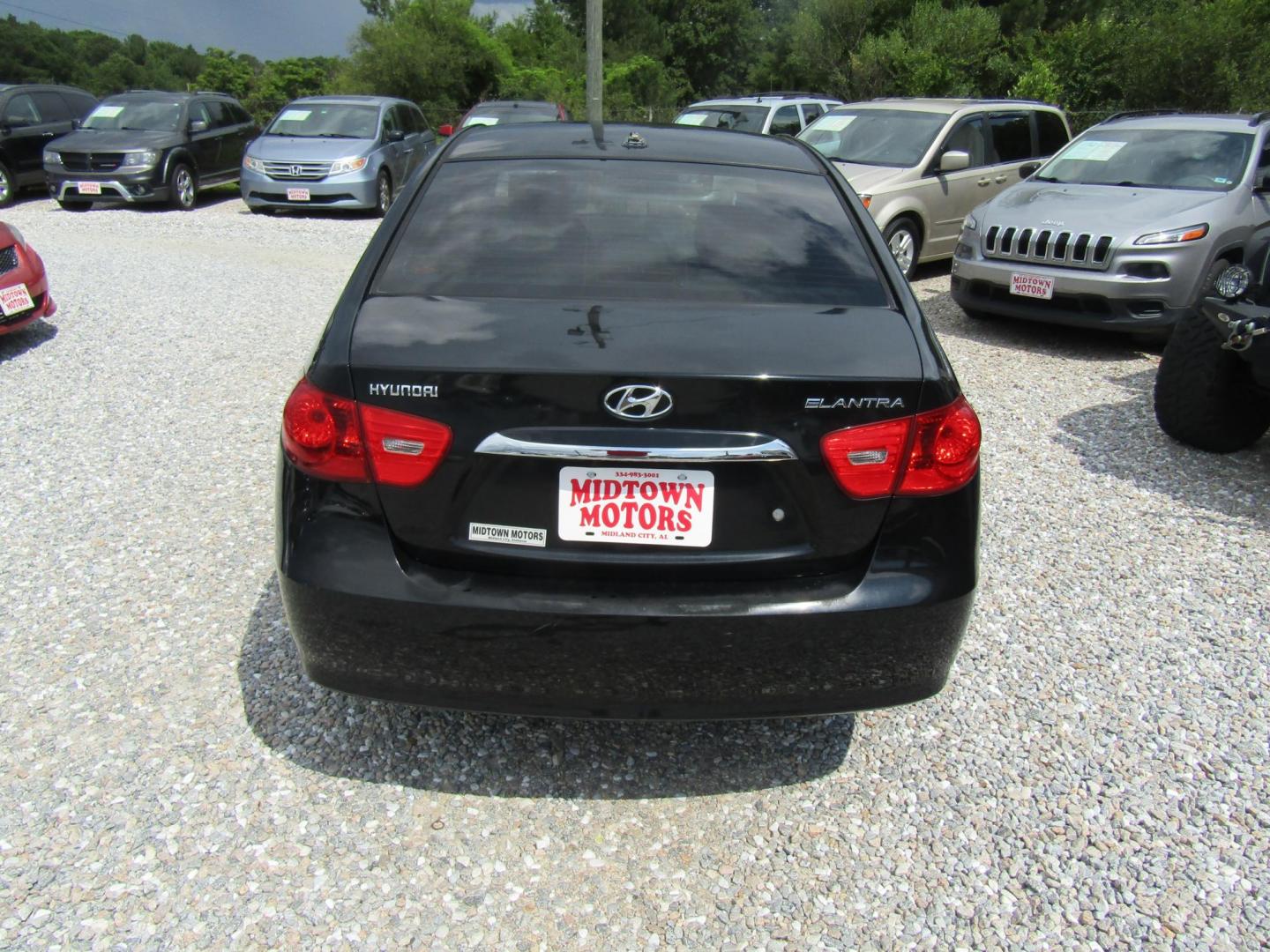 2010 Black Hyundai Elantra GLS (KMHDU4AD1AU) with an 2.0L L4 DOHC 16V engine, Automatic transmission, located at 15016 S Hwy 231, Midland City, AL, 36350, (334) 983-3001, 31.306210, -85.495277 - Photo#6