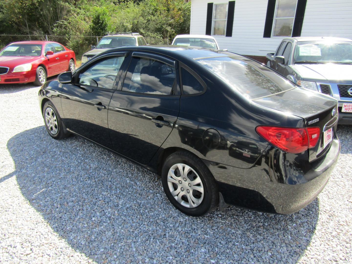 2010 Blue Hyundai Elantra GLS (KMHDU4AD1AU) with an 2.0L L4 DOHC 16V engine, Automatic transmission, located at 15016 S Hwy 231, Midland City, AL, 36350, (334) 983-3001, 31.306210, -85.495277- Photo#4