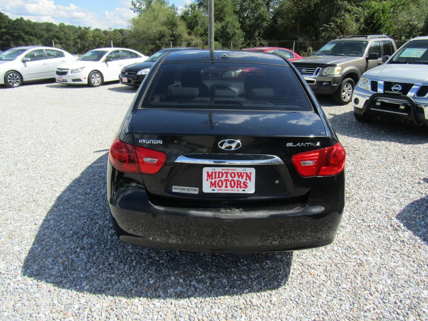 2010 Blue Hyundai Elantra GLS (KMHDU4AD1AU) with an 2.0L L4 DOHC 16V engine, Automatic transmission, located at 15016 S Hwy 231, Midland City, AL, 36350, (334) 983-3001, 31.306210, -85.495277- Photo#5
