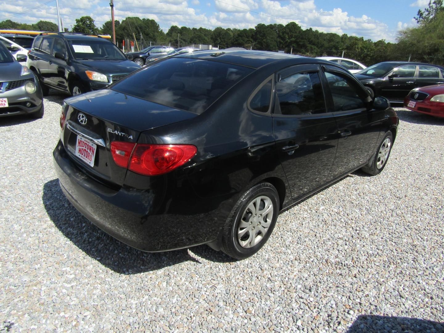 2010 Blue Hyundai Elantra GLS (KMHDU4AD1AU) with an 2.0L L4 DOHC 16V engine, Automatic transmission, located at 15016 S Hwy 231, Midland City, AL, 36350, (334) 983-3001, 31.306210, -85.495277- Photo#6