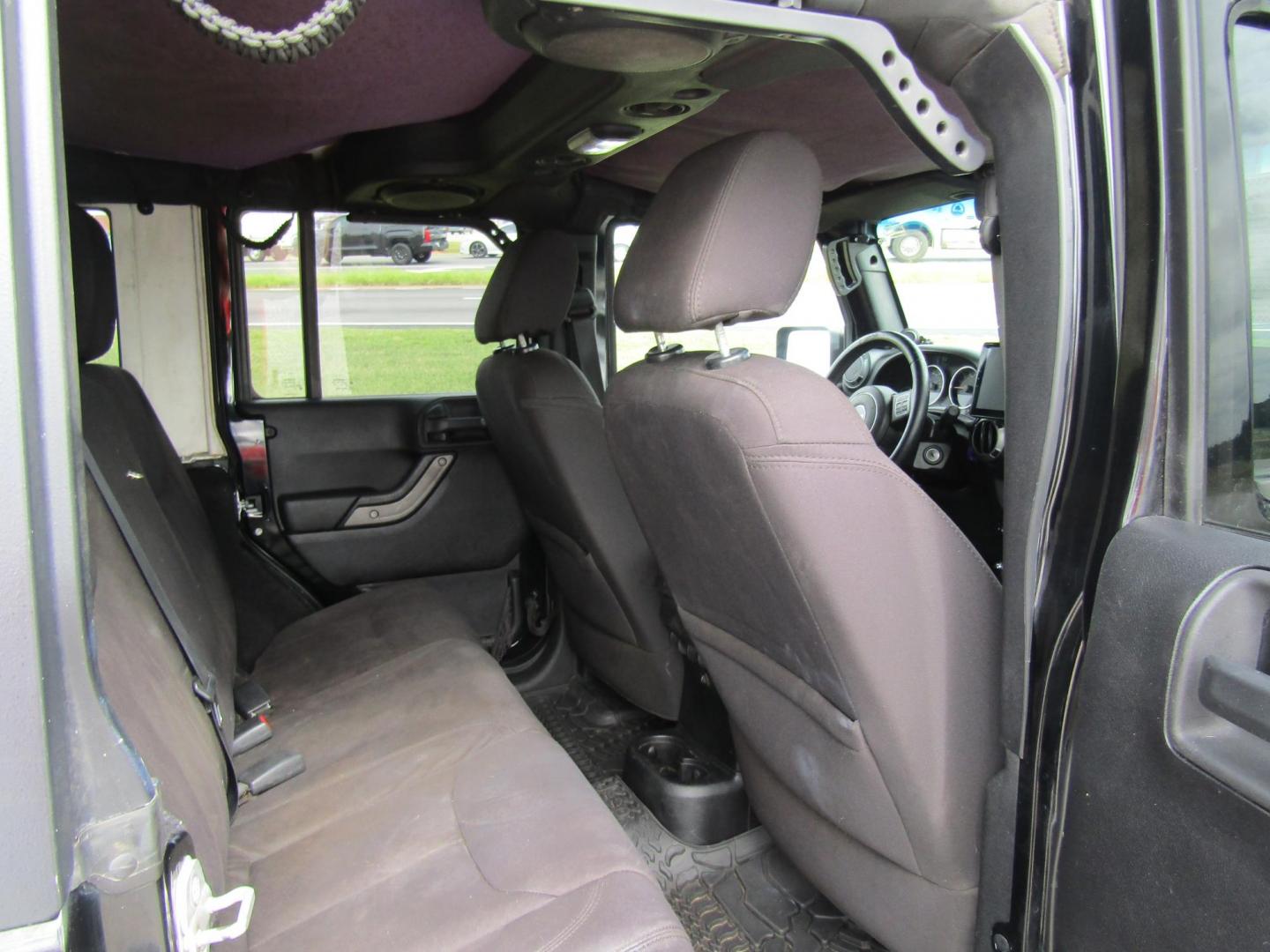 2014 Black Jeep Wrangler Unlimited Sport 4WD (1C4BJWDG7EL) with an 3.6L V6 DOHC 24V FFV engine, Automatic transmission, located at 15016 S Hwy 231, Midland City, AL, 36350, (334) 983-3001, 31.306210, -85.495277 - Photo#6