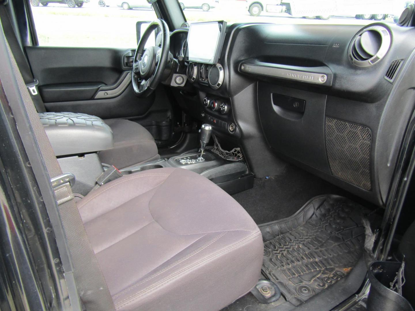 2014 Black Jeep Wrangler Unlimited Sport 4WD (1C4BJWDG7EL) with an 3.6L V6 DOHC 24V FFV engine, Automatic transmission, located at 15016 S Hwy 231, Midland City, AL, 36350, (334) 983-3001, 31.306210, -85.495277 - Photo#7