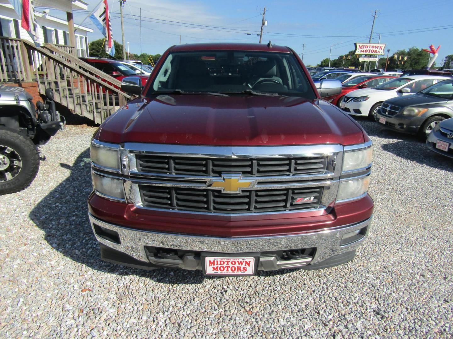 2014 Maroon /Gray Chevrolet Silverado 1500 1LZ Crew Cab 4WD (3GCUKSEC7EG) with an 5.3L V8 OHV 16V engine, Automatic transmission, located at 15016 S Hwy 231, Midland City, AL, 36350, (334) 983-3001, 31.306210, -85.495277 - Photo#1