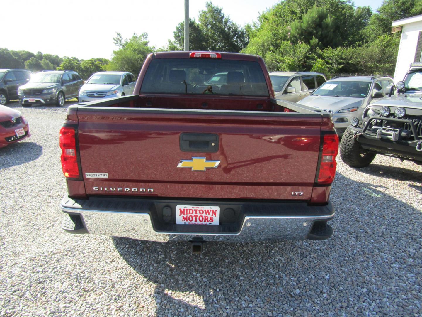 2014 Maroon /Gray Chevrolet Silverado 1500 1LZ Crew Cab 4WD (3GCUKSEC7EG) with an 5.3L V8 OHV 16V engine, Automatic transmission, located at 15016 S Hwy 231, Midland City, AL, 36350, (334) 983-3001, 31.306210, -85.495277 - Photo#6