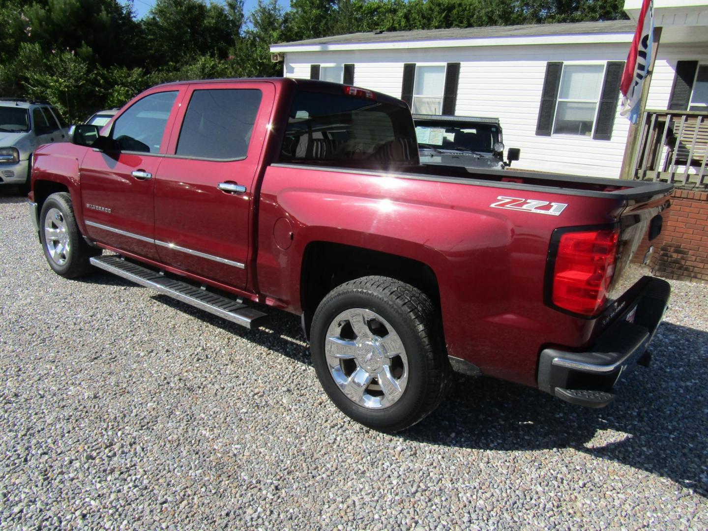 2014 Maroon /Gray Chevrolet Silverado 1500 1LZ Crew Cab 4WD (3GCUKSEC7EG) with an 5.3L V8 OHV 16V engine, Automatic transmission, located at 15016 S Hwy 231, Midland City, AL, 36350, (334) 983-3001, 31.306210, -85.495277 - Photo#5
