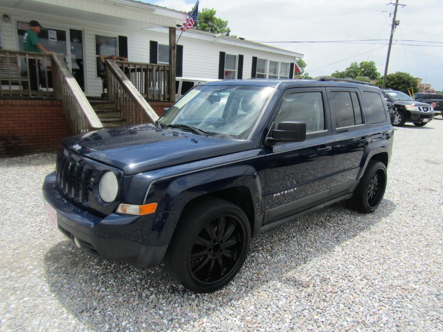 2012 Blue /Tan Jeep Patriot Sport 2WD (1C4NJPBA1CD) with an 2.0L L4 DOHC 16V engine, Automatic transmission, located at 15016 S Hwy 231, Midland City, AL, 36350, (334) 983-3001, 31.306210, -85.495277 - Photo#2