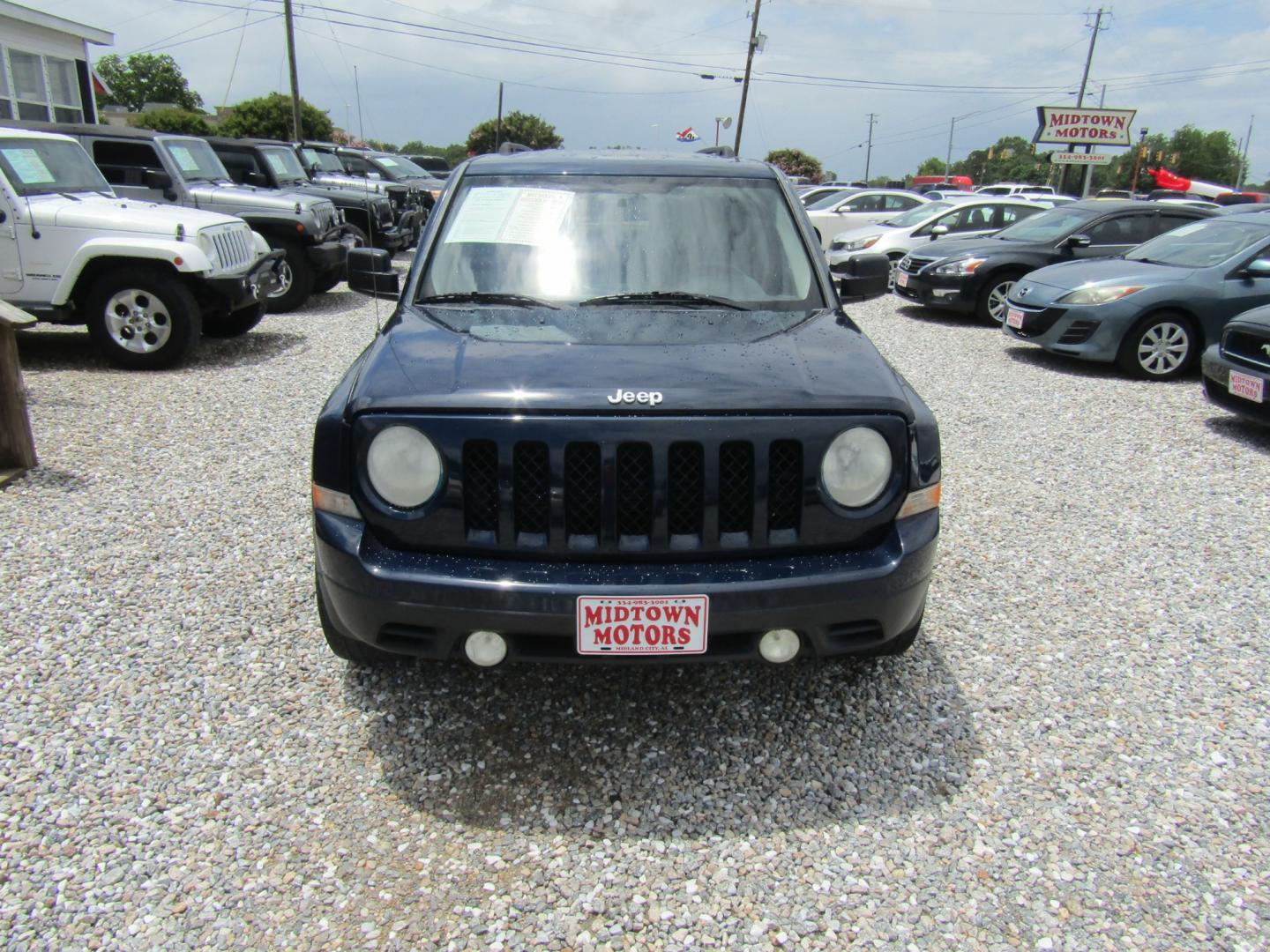 2012 Blue /Tan Jeep Patriot Sport 2WD (1C4NJPBA1CD) with an 2.0L L4 DOHC 16V engine, Automatic transmission, located at 15016 S Hwy 231, Midland City, AL, 36350, (334) 983-3001, 31.306210, -85.495277 - Photo#1