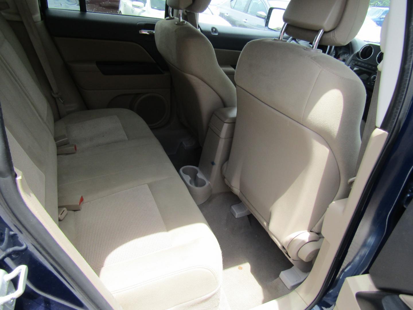 2012 Blue /Tan Jeep Patriot Sport 2WD (1C4NJPBA1CD) with an 2.0L L4 DOHC 16V engine, Automatic transmission, located at 15016 S Hwy 231, Midland City, AL, 36350, (334) 983-3001, 31.306210, -85.495277 - Photo#8