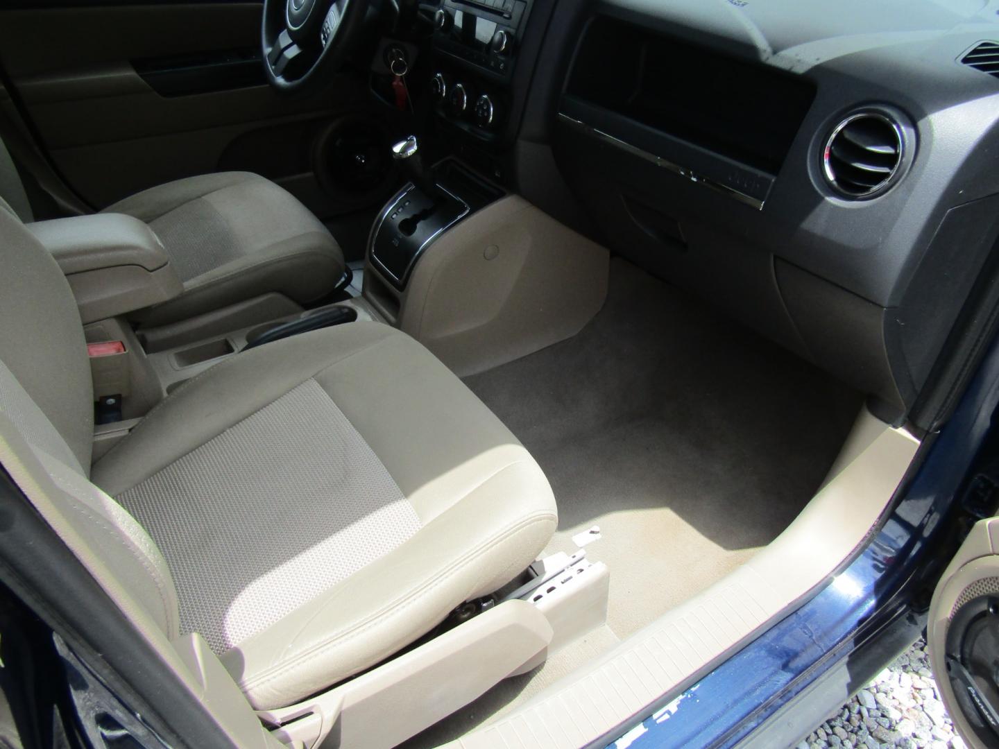 2012 Blue /Tan Jeep Patriot Sport 2WD (1C4NJPBA1CD) with an 2.0L L4 DOHC 16V engine, Automatic transmission, located at 15016 S Hwy 231, Midland City, AL, 36350, (334) 983-3001, 31.306210, -85.495277 - Photo#9