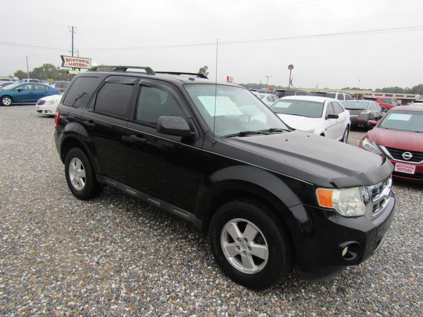 2012 Black /Gray Ford Escape XLT FWD (1FMCU0DG1CK) with an 3.0L V6 DOHC 24V engine, Automatic transmission, located at 15016 S Hwy 231, Midland City, AL, 36350, (334) 983-3001, 31.306210, -85.495277 - Photo#0