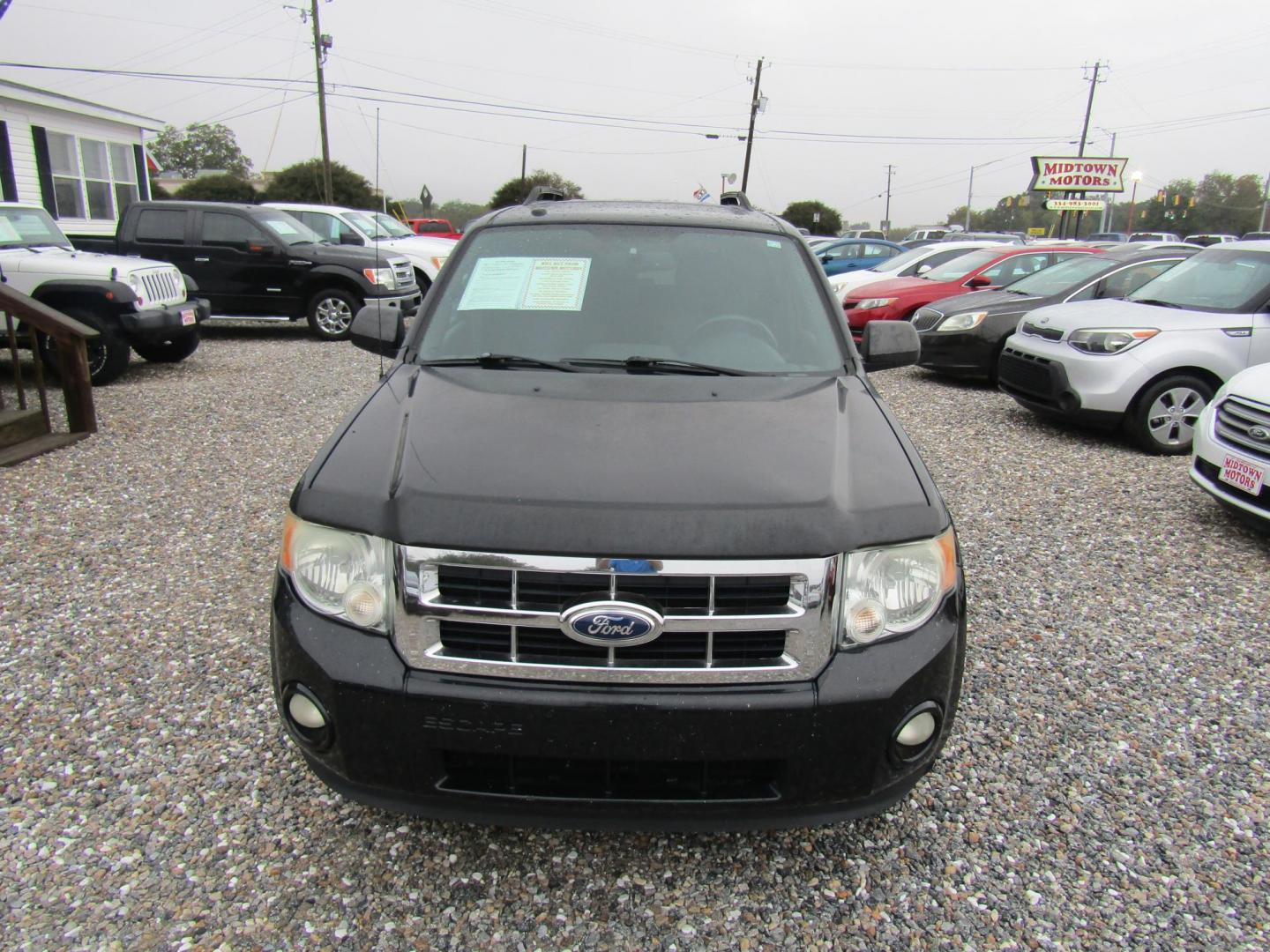 2012 Black /Gray Ford Escape XLT FWD (1FMCU0DG1CK) with an 3.0L V6 DOHC 24V engine, Automatic transmission, located at 15016 S Hwy 231, Midland City, AL, 36350, (334) 983-3001, 31.306210, -85.495277 - Photo#1