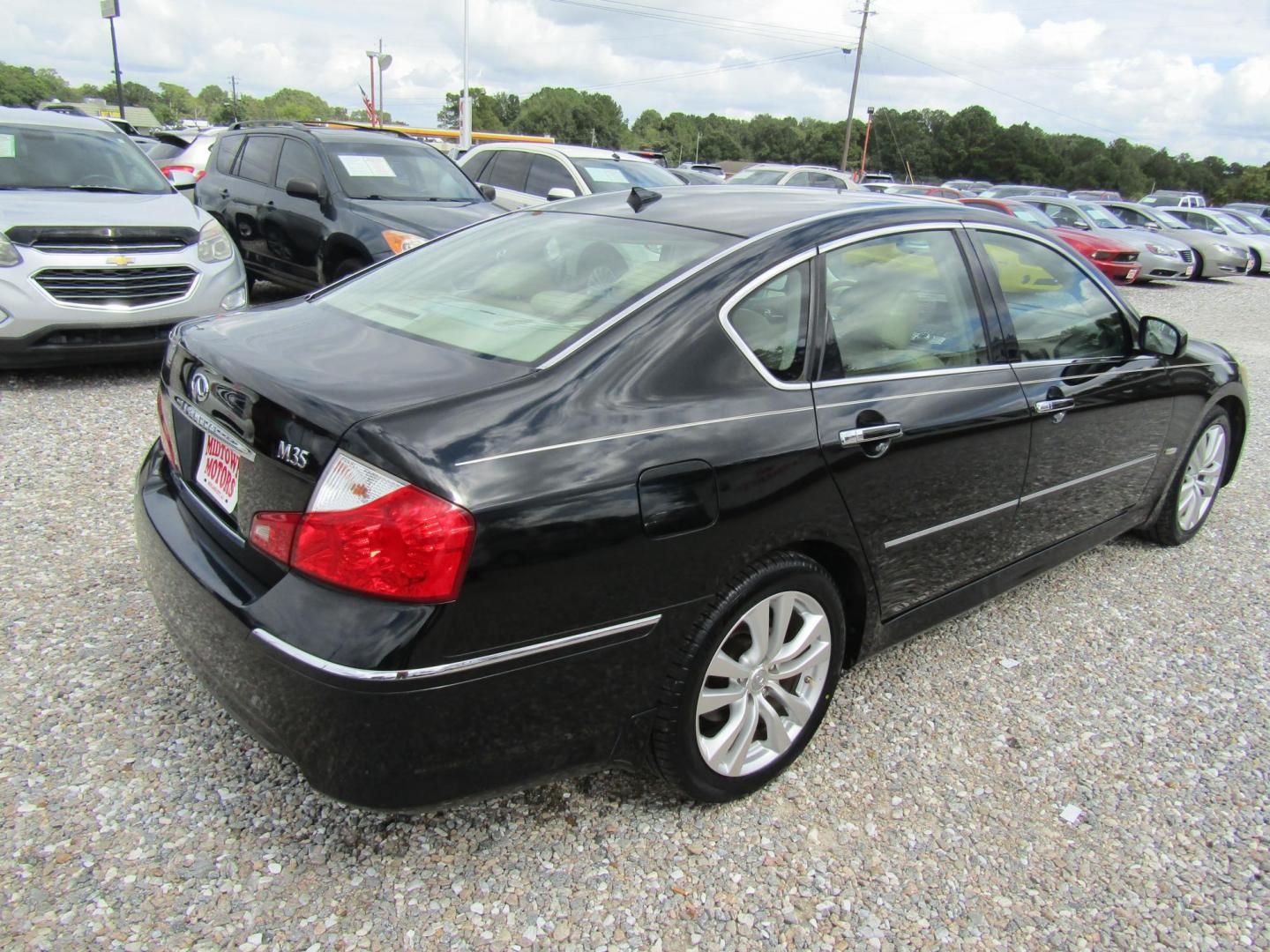 2010 Black Infiniti M 35 (JN1CY0AP0AM) with an 3.5L V6 DOHC 24V engine, Automatic transmission, located at 15016 S Hwy 231, Midland City, AL, 36350, (334) 983-3001, 31.306210, -85.495277 - Photo#6