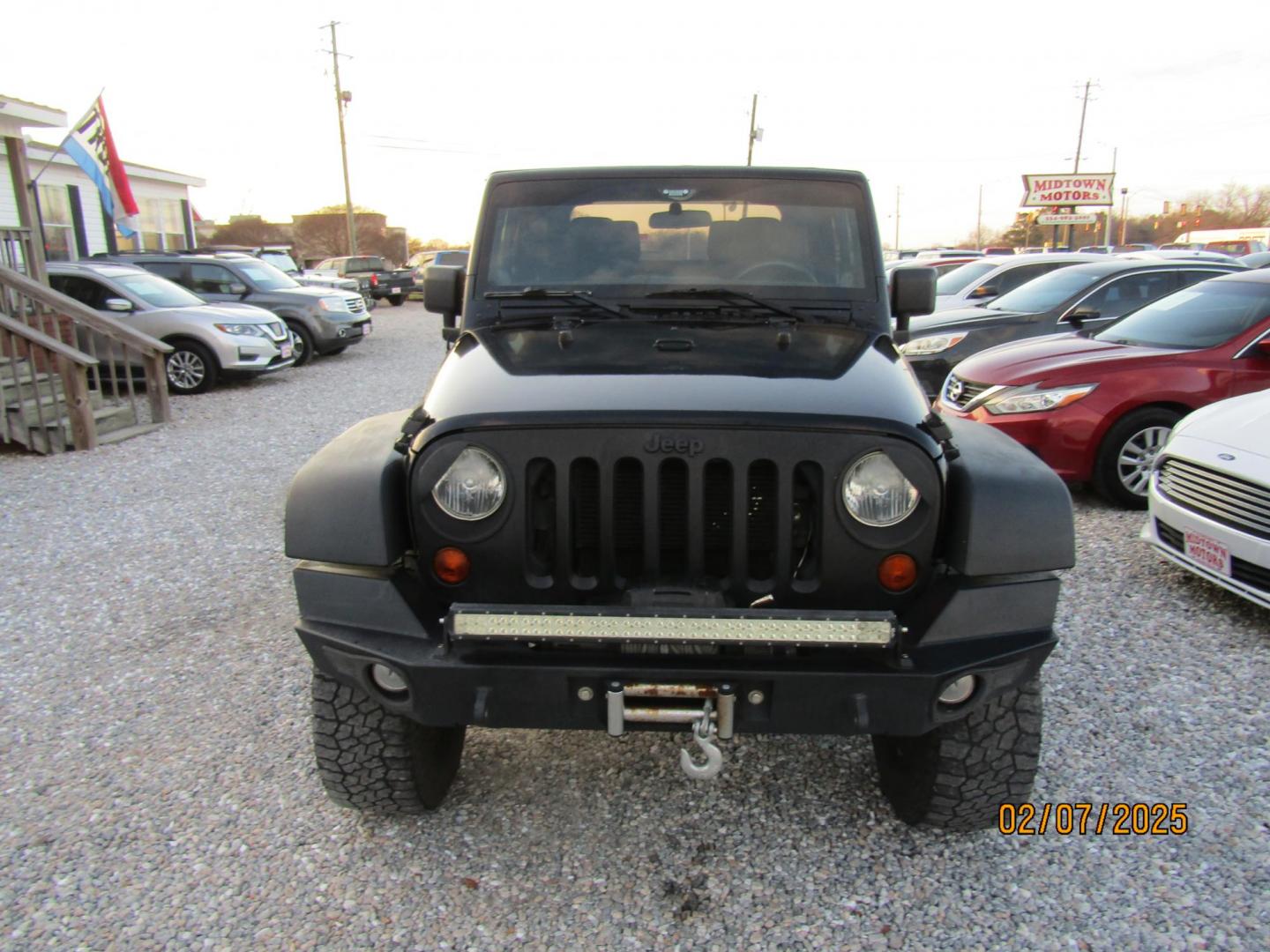 2012 Black /Black Jeep Wrangler Sport 4WD (1C4AJWAG8CL) with an 3.6L V6 DOHC 24V FFV engine, Automatic transmission, located at 15016 S Hwy 231, Midland City, AL, 36350, (334) 983-3001, 31.306210, -85.495277 - Photo#1