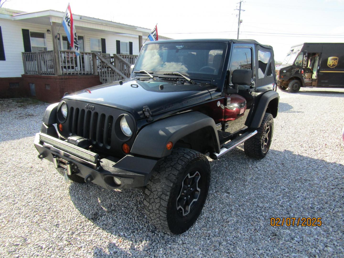 2012 Black /Black Jeep Wrangler Sport 4WD (1C4AJWAG8CL) with an 3.6L V6 DOHC 24V FFV engine, Automatic transmission, located at 15016 S Hwy 231, Midland City, AL, 36350, (334) 983-3001, 31.306210, -85.495277 - Photo#2