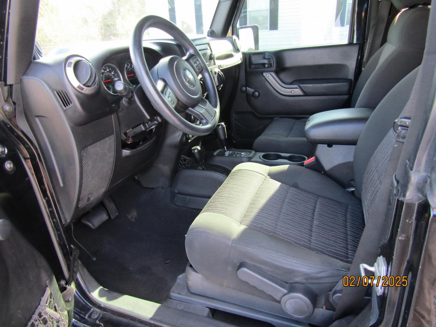 2012 Black /Black Jeep Wrangler Sport 4WD (1C4AJWAG8CL) with an 3.6L V6 DOHC 24V FFV engine, Automatic transmission, located at 15016 S Hwy 231, Midland City, AL, 36350, (334) 983-3001, 31.306210, -85.495277 - Photo#3