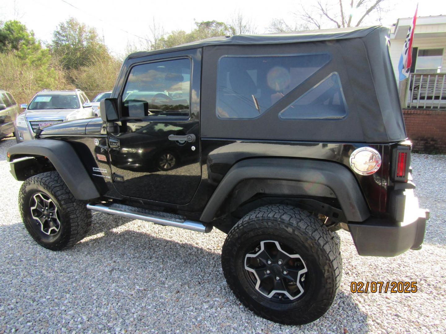 2012 Black /Black Jeep Wrangler Sport 4WD (1C4AJWAG8CL) with an 3.6L V6 DOHC 24V FFV engine, Automatic transmission, located at 15016 S Hwy 231, Midland City, AL, 36350, (334) 983-3001, 31.306210, -85.495277 - Photo#4