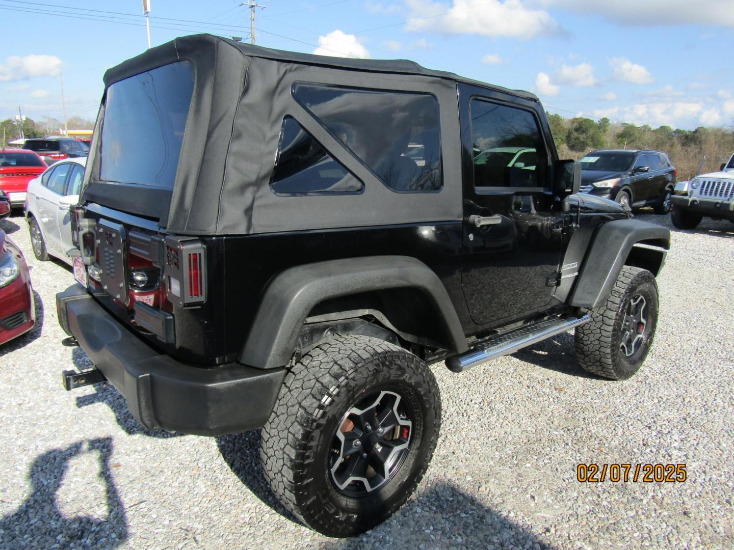 2012 Black /Black Jeep Wrangler Sport 4WD (1C4AJWAG8CL) with an 3.6L V6 DOHC 24V FFV engine, Automatic transmission, located at 15016 S Hwy 231, Midland City, AL, 36350, (334) 983-3001, 31.306210, -85.495277 - Photo#6