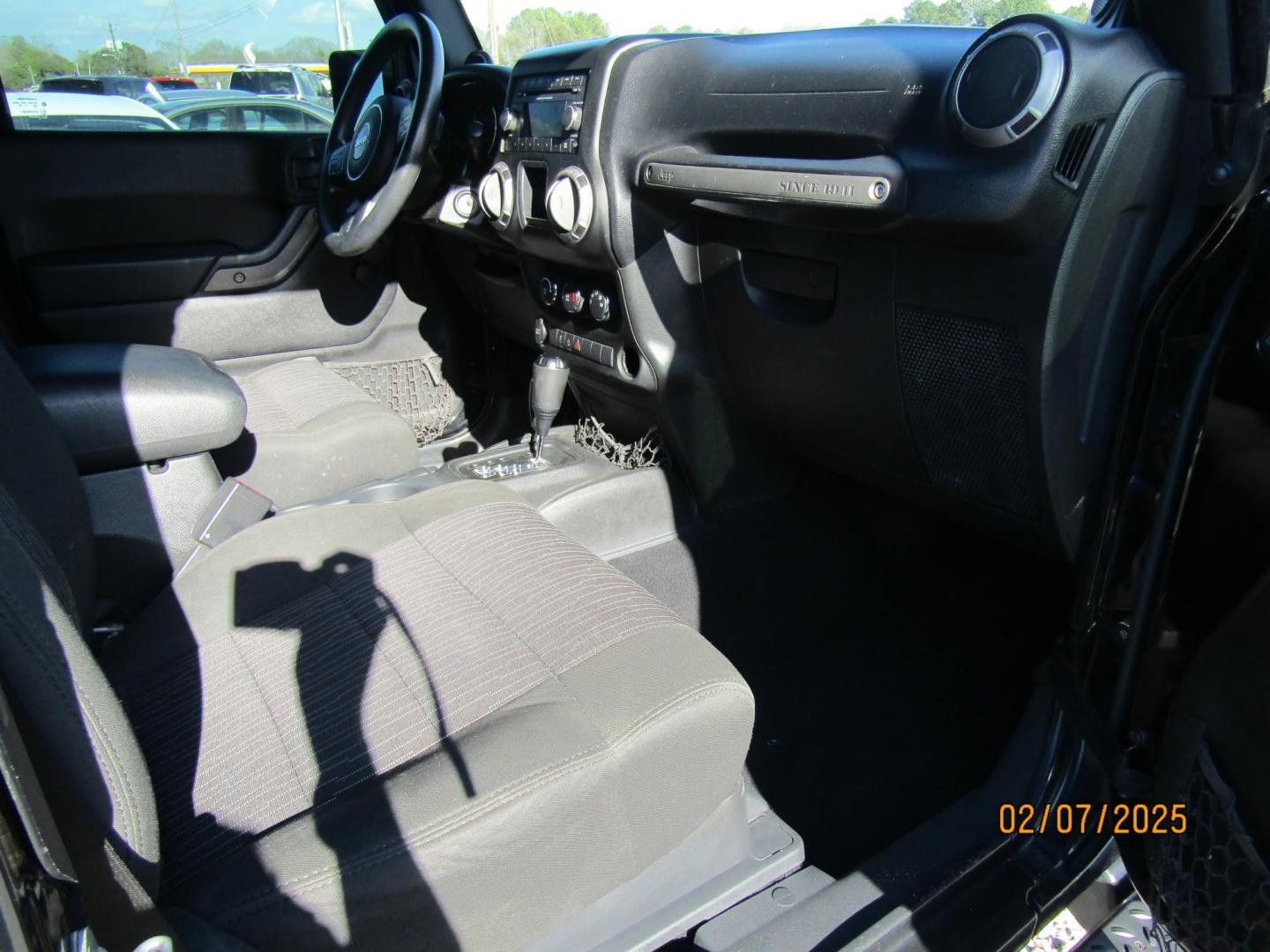 2012 Black /Black Jeep Wrangler Sport 4WD (1C4AJWAG8CL) with an 3.6L V6 DOHC 24V FFV engine, Automatic transmission, located at 15016 S Hwy 231, Midland City, AL, 36350, (334) 983-3001, 31.306210, -85.495277 - Photo#7
