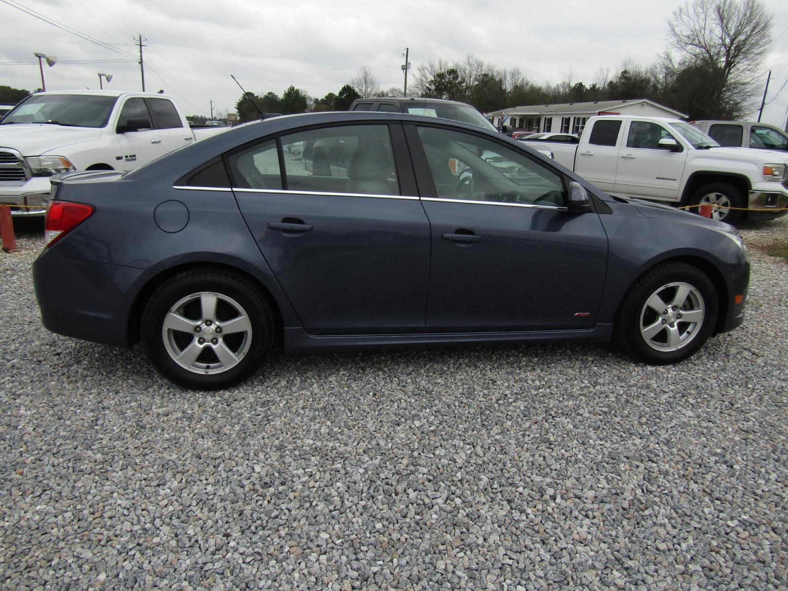 2013 Blue Chevrolet Cruze 1LT Auto (1G1PC5SB3D7) with an 1.4L L4 DOHC 16V TURBO engine, Automatic transmission, located at 15016 S Hwy 231, Midland City, AL, 36350, (334) 983-3001, 31.306210, -85.495277 - Photo #7