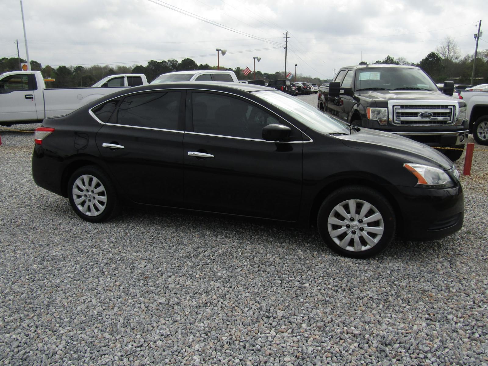 2015 Black Nissan Sentra S 6MT (3N1AB7APXFL) with an 1.8L L4 SFI DOHC 16V engine, Automatic transmission, located at 15016 S Hwy 231, Midland City, AL, 36350, (334) 983-3001, 31.306210, -85.495277 - Photo #0