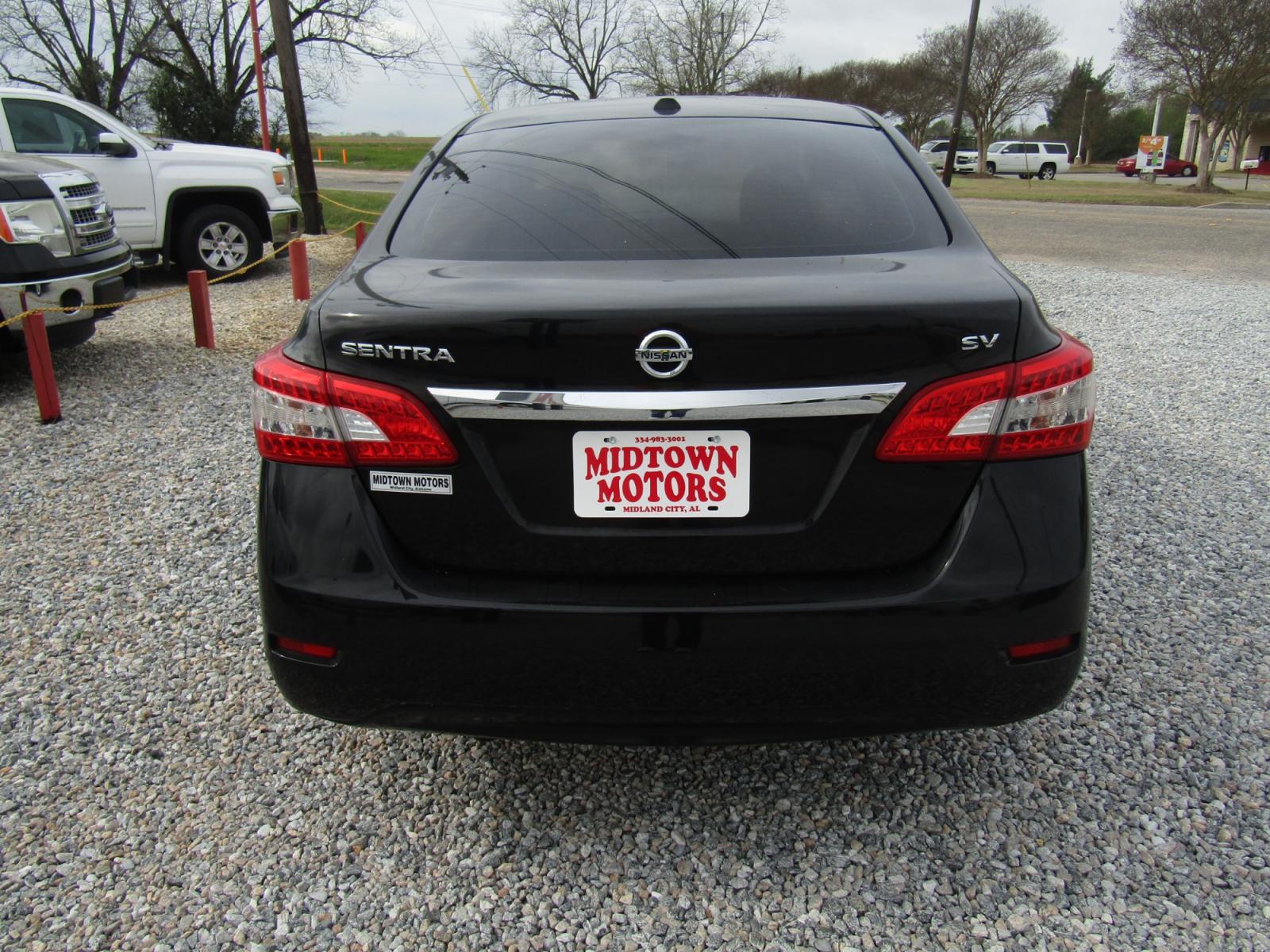 2015 Black Nissan Sentra S 6MT (3N1AB7APXFL) with an 1.8L L4 SFI DOHC 16V engine, Automatic transmission, located at 15016 S Hwy 231, Midland City, AL, 36350, (334) 983-3001, 31.306210, -85.495277 - Photo #7