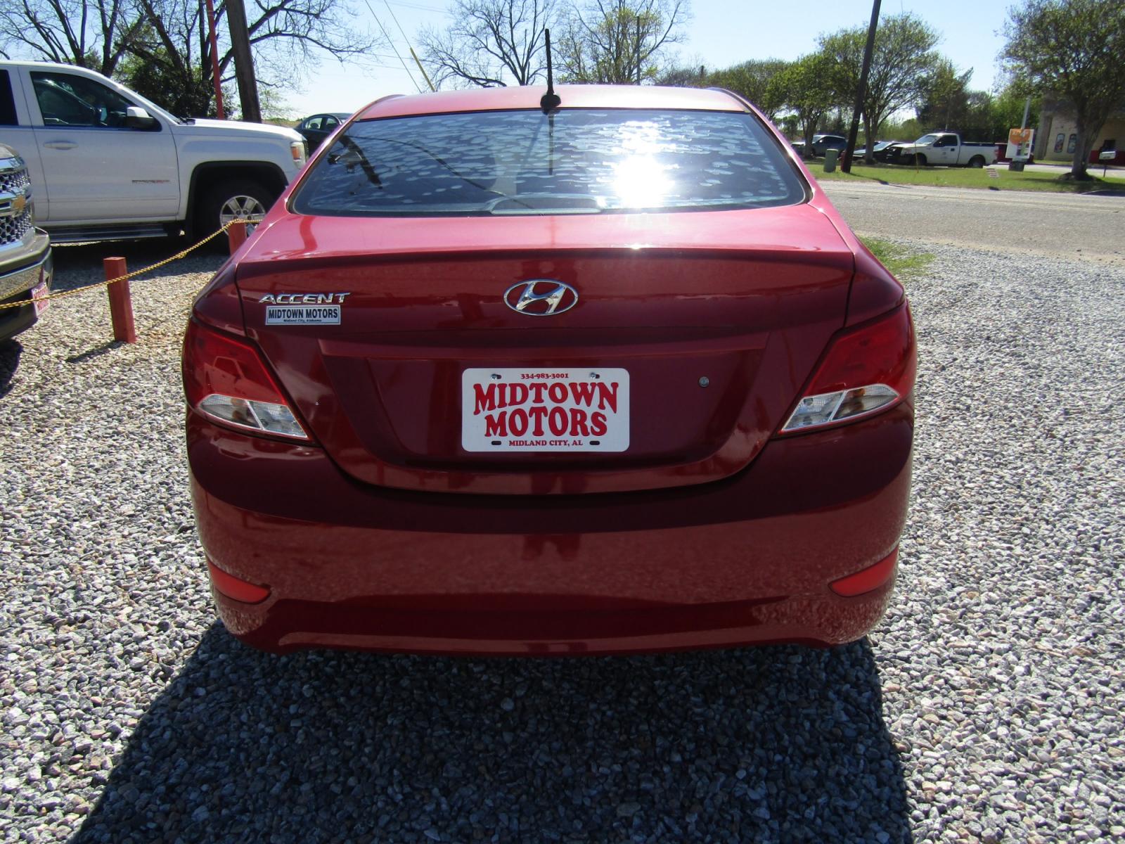 2015 Red /Gray Hyundai Accent GLS 4-Door 6A (KMHCT4AE0FU) with an 1.6L L4 DOHC 16V engine, Automatic transmission, located at 15016 S Hwy 231, Midland City, AL, 36350, (334) 983-3001, 31.306210, -85.495277 - Photo #6
