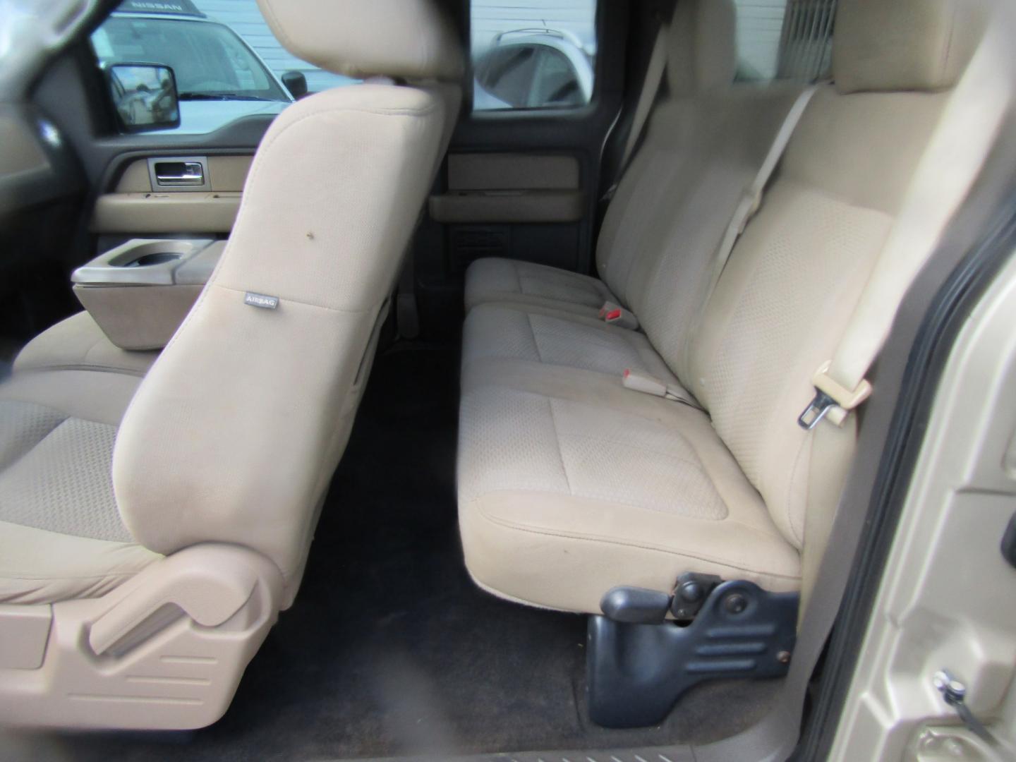 2010 Gold Ford F-150 Lariat SuperCab 6.5-ft. Bed 2WD (1FTEX1C87AF) with an 4.6L V8 SOHC 24V engine, Automatic transmission, located at 15016 S Hwy 231, Midland City, AL, 36350, (334) 983-3001, 31.306210, -85.495277- Photo#3