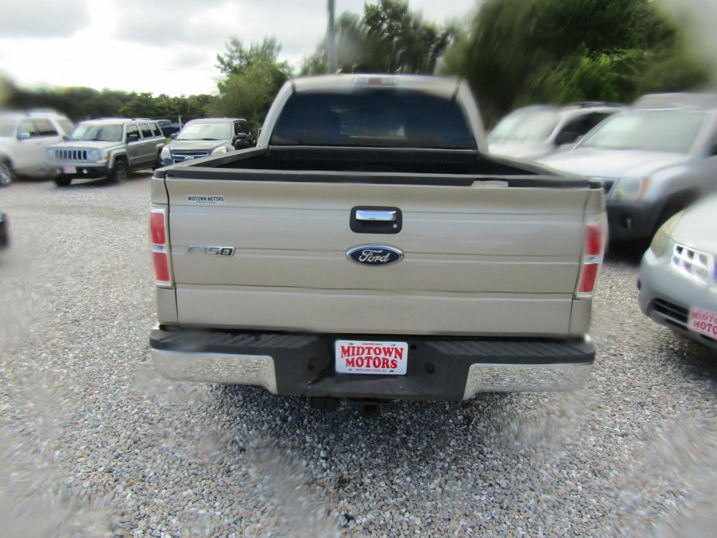 2010 Gold Ford F-150 Lariat SuperCab 6.5-ft. Bed 2WD (1FTEX1C87AF) with an 4.6L V8 SOHC 24V engine, Automatic transmission, located at 15016 S Hwy 231, Midland City, AL, 36350, (334) 983-3001, 31.306210, -85.495277- Photo#5