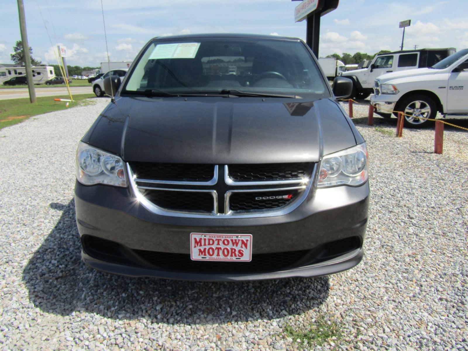 2016 Gray /Gray Dodge Grand Caravan SE (2C4RDGBG4GR) with an 3.6L V6 DOHC 24V engine, Automatic transmission, located at 15016 S Hwy 231, Midland City, AL, 36350, (334) 983-3001, 31.306210, -85.495277 - Photo #1