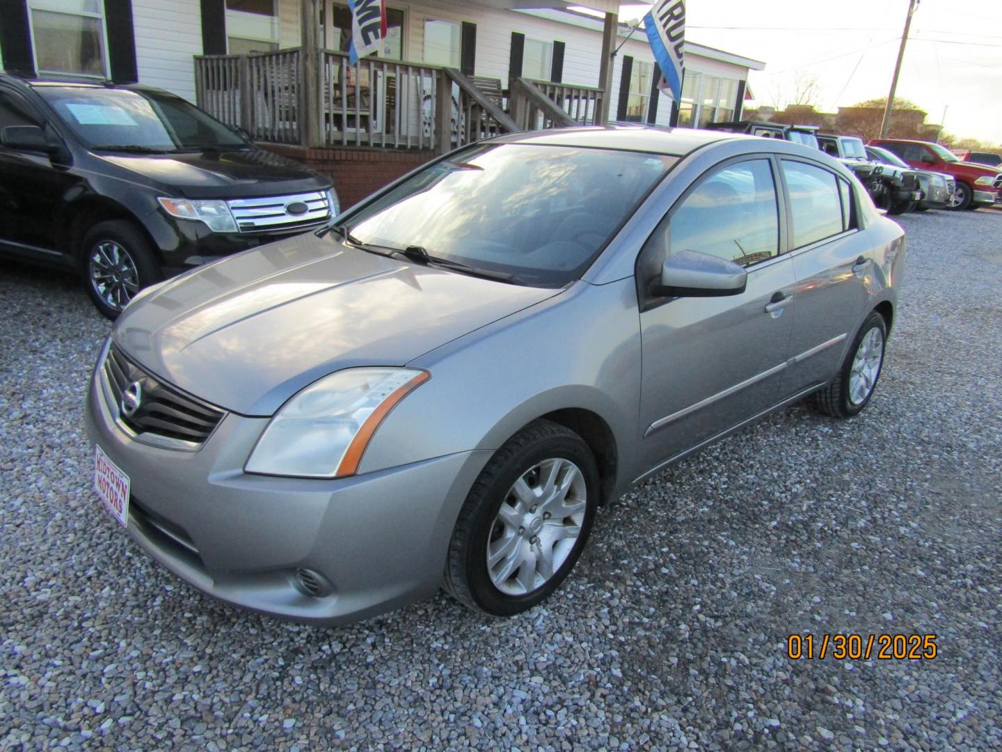 2010 Silver /Gray Honda Civic DX-VP Sedan 5-Speed AT (19XFA1F38AE) with an 1.8L L4 SOHC 16V engine, Automatic transmission, located at 15016 S Hwy 231, Midland City, AL, 36350, (334) 983-3001, 31.306210, -85.495277 - Photo#2