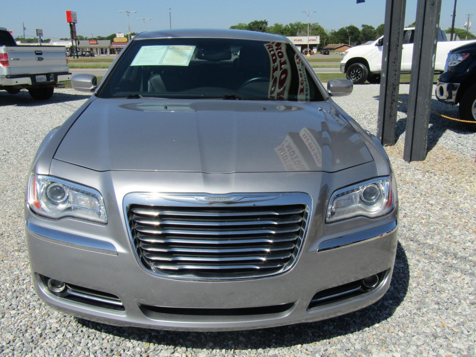 2014 Silver Chrysler 300 RWD (2C3CCAAG7EH) with an 3.6L V6 SOHC 24V engine, Automatic transmission, located at 15016 S Hwy 231, Midland City, AL, 36350, (334) 983-3001, 31.306210, -85.495277 - Photo #1