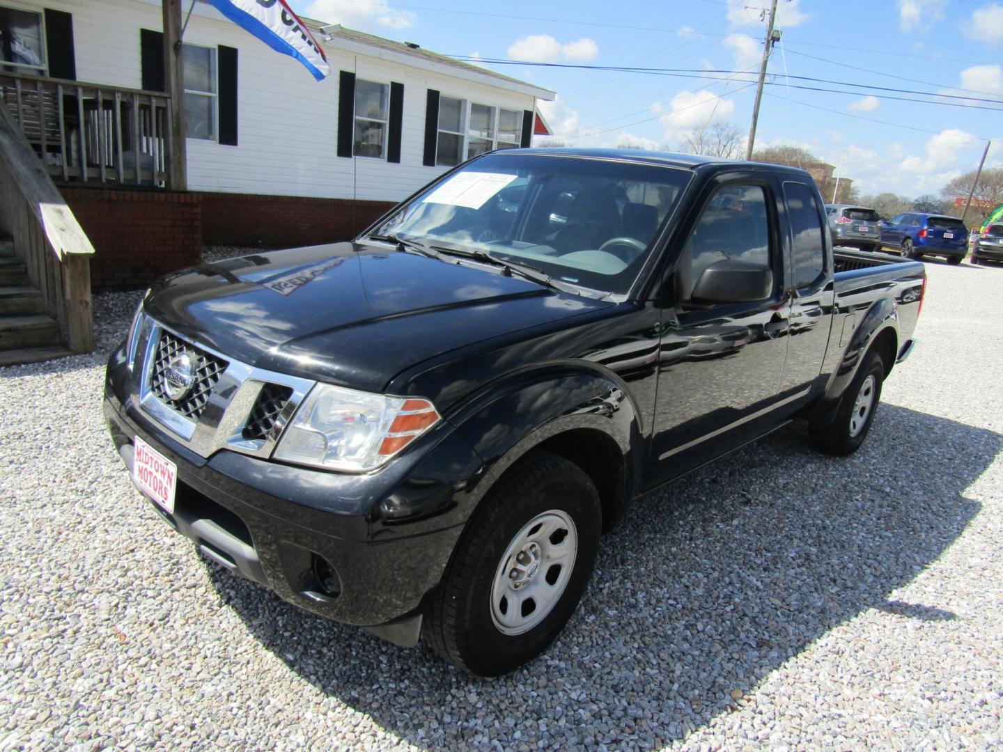 2014 Black Nissan Frontier SV King Cab I4 5MT 2WD (1N6BD0CT2EN) with an 2.5L L4 DOHC 16V engine, Automatic transmission, located at 15016 S Hwy 231, Midland City, AL, 36350, (334) 983-3001, 31.306210, -85.495277 - Photo#2