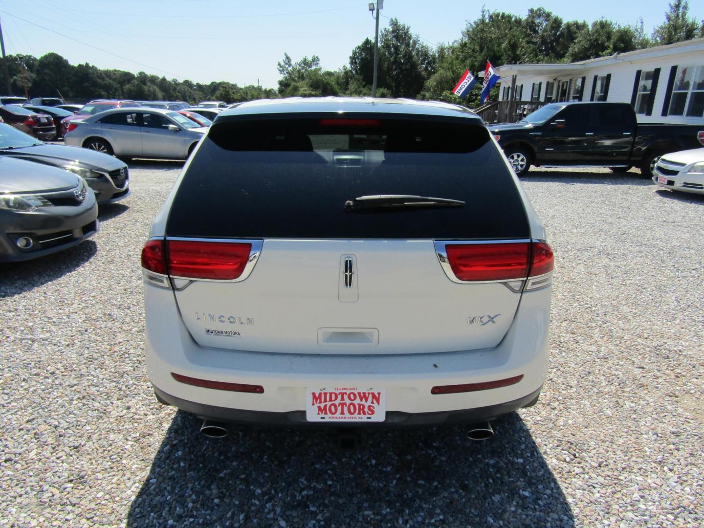 2013 White Lincoln MKX FWD (2LMDJ6JK0DB) with an 3.7L V6 DOHC 24V engine, Automatic transmission, located at 15016 S Hwy 231, Midland City, AL, 36350, (334) 983-3001, 31.306210, -85.495277 - Photo#6
