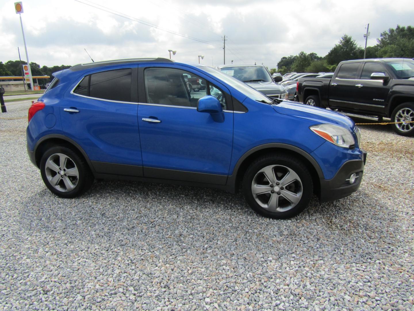2013 Blue /Gray Buick Encore Premium FWD (KL4CJDSBXDB) with an 1.4L L4 DOHC 16V TURBO engine, 6-Speed Automatic transmission, located at 15016 S Hwy 231, Midland City, AL, 36350, (334) 983-3001, 31.306210, -85.495277 - Photo#0