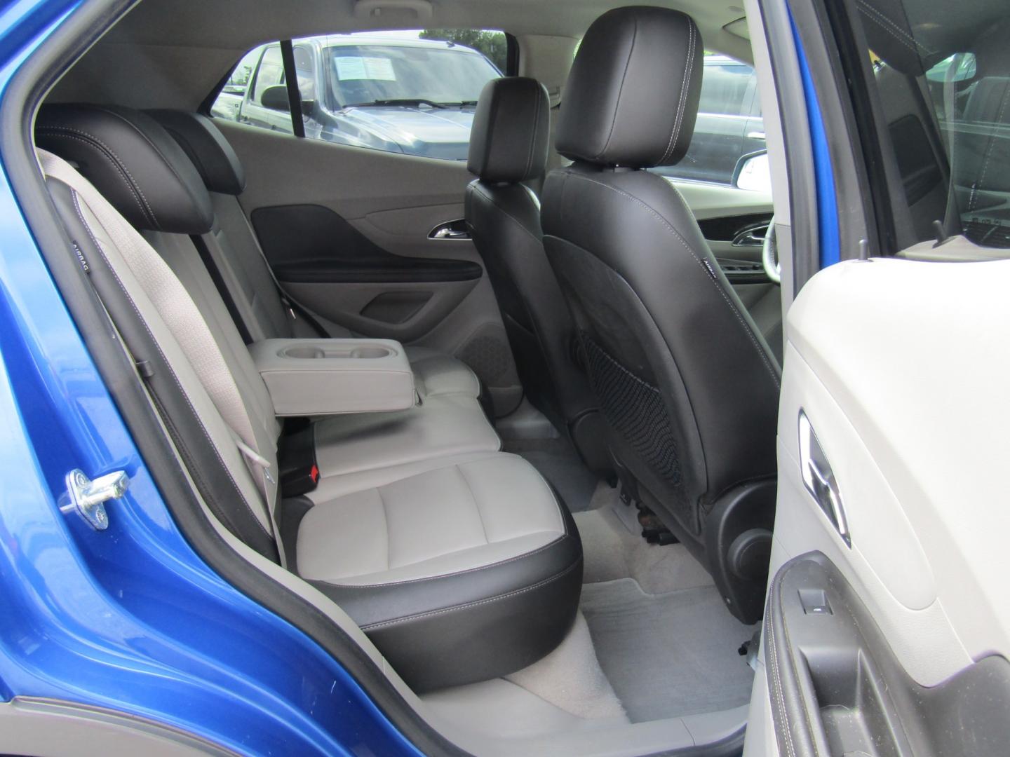 2013 Blue /Gray Buick Encore Premium FWD (KL4CJDSBXDB) with an 1.4L L4 DOHC 16V TURBO engine, 6-Speed Automatic transmission, located at 15016 S Hwy 231, Midland City, AL, 36350, (334) 983-3001, 31.306210, -85.495277 - Photo#9