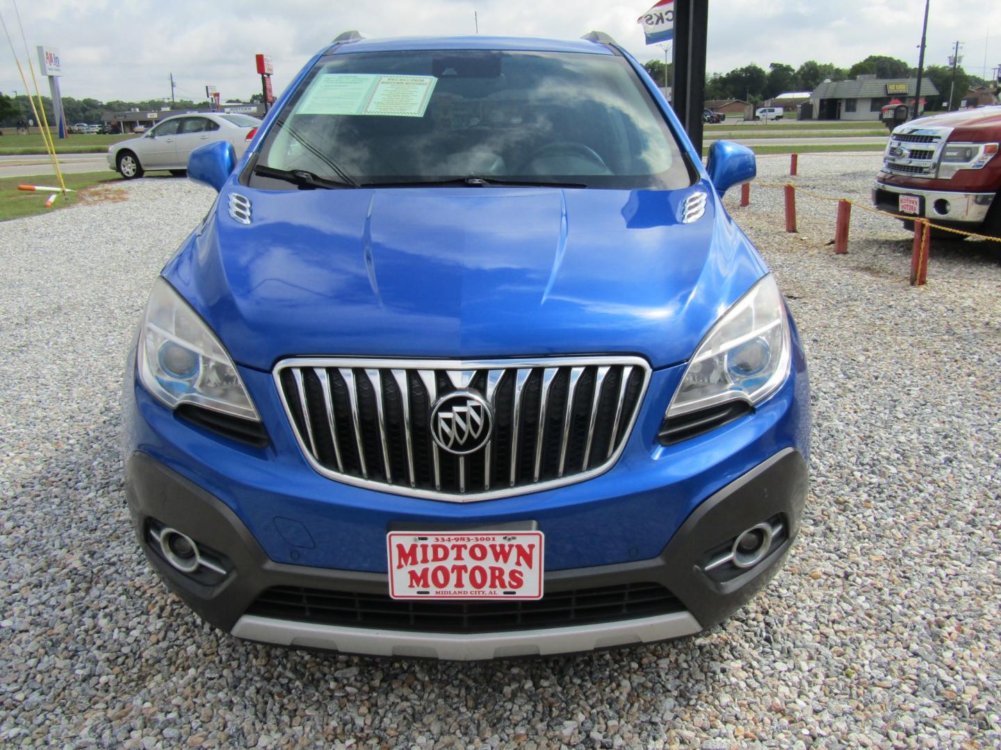 2013 Blue /Gray Buick Encore Premium FWD (KL4CJDSBXDB) with an 1.4L L4 DOHC 16V TURBO engine, 6-Speed Automatic transmission, located at 15016 S Hwy 231, Midland City, AL, 36350, (334) 983-3001, 31.306210, -85.495277 - Photo#1
