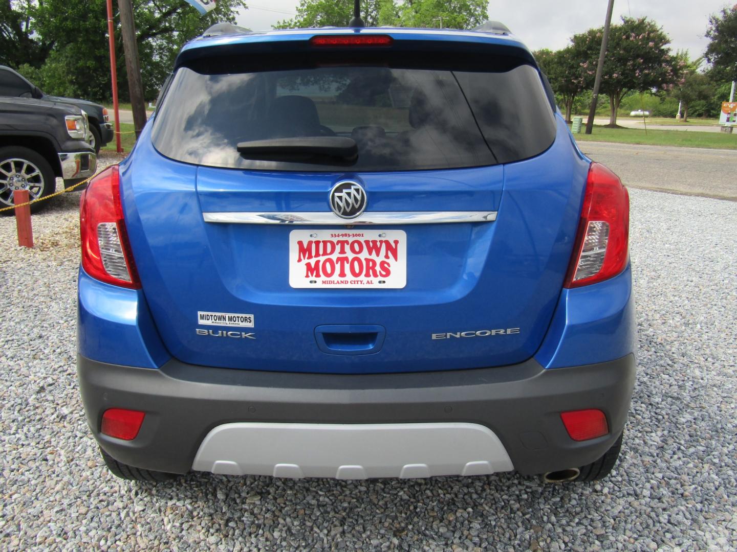 2013 Blue /Gray Buick Encore Premium FWD (KL4CJDSBXDB) with an 1.4L L4 DOHC 16V TURBO engine, 6-Speed Automatic transmission, located at 15016 S Hwy 231, Midland City, AL, 36350, (334) 983-3001, 31.306210, -85.495277 - Photo#6