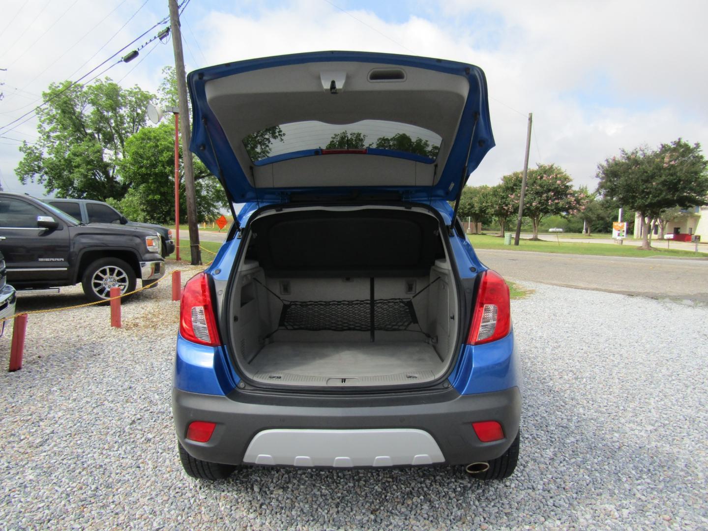 2013 Blue /Gray Buick Encore Premium FWD (KL4CJDSBXDB) with an 1.4L L4 DOHC 16V TURBO engine, 6-Speed Automatic transmission, located at 15016 S Hwy 231, Midland City, AL, 36350, (334) 983-3001, 31.306210, -85.495277 - Photo#7