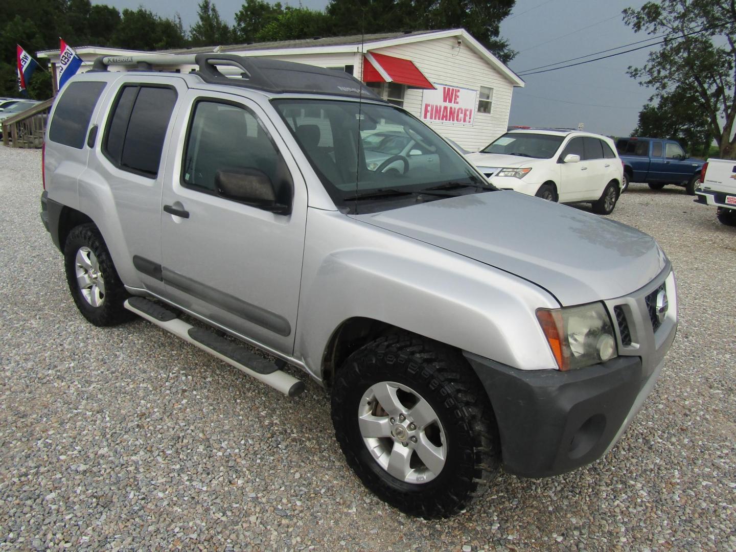 2012 Silver /Black Nissan Xterra S 2WD (5N1AN0NU7CC) with an 4.0L V6 DOHC 24V engine, Automatic transmission, located at 15016 S Hwy 231, Midland City, AL, 36350, (334) 983-3001, 31.306210, -85.495277 - Photo#0