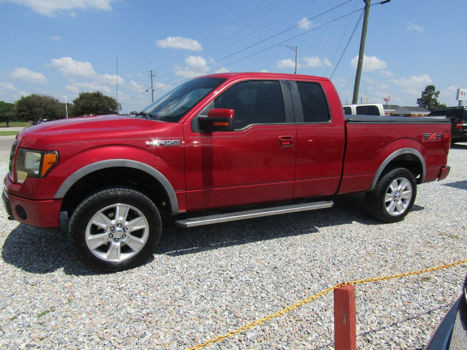 2010 Red Ford F-150 FX4 SuperCab 6.5-ft. Bed 4WD (1FTFX1EV3AK) with an 5.4L V8 SOHC 24V FFV engine, Automatic transmission, located at 15016 S Hwy 231, Midland City, AL, 36350, (334) 983-3001, 31.306210, -85.495277 - Photo #3