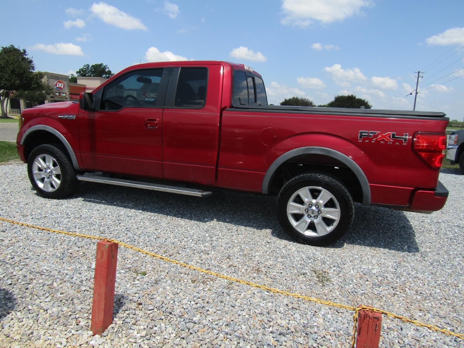 2010 Red Ford F-150 FX4 SuperCab 6.5-ft. Bed 4WD (1FTFX1EV3AK) with an 5.4L V8 SOHC 24V FFV engine, Automatic transmission, located at 15016 S Hwy 231, Midland City, AL, 36350, (334) 983-3001, 31.306210, -85.495277 - Photo #6
