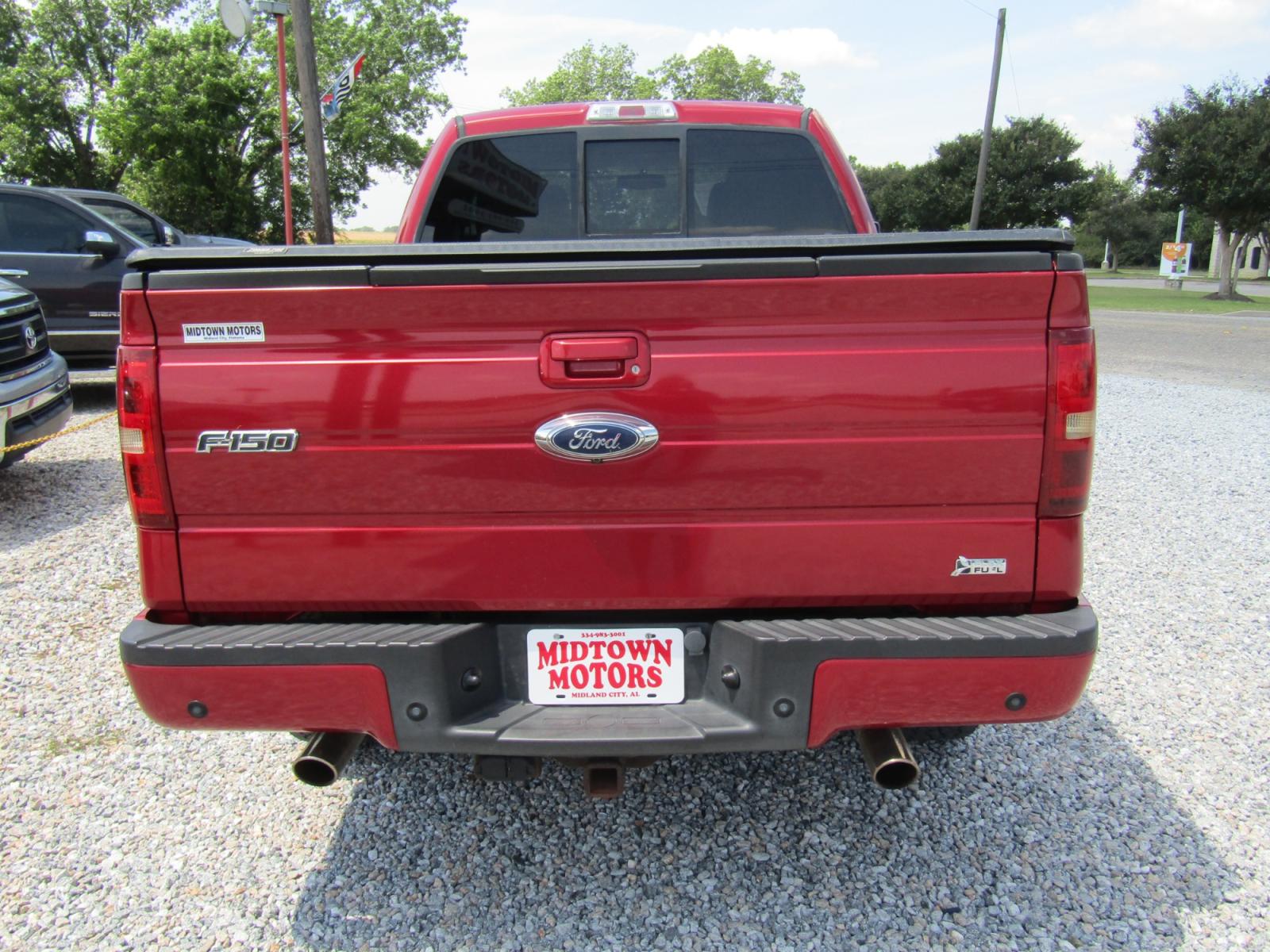 2010 Red Ford F-150 FX4 SuperCab 6.5-ft. Bed 4WD (1FTFX1EV3AK) with an 5.4L V8 SOHC 24V FFV engine, Automatic transmission, located at 15016 S Hwy 231, Midland City, AL, 36350, (334) 983-3001, 31.306210, -85.495277 - Photo #7